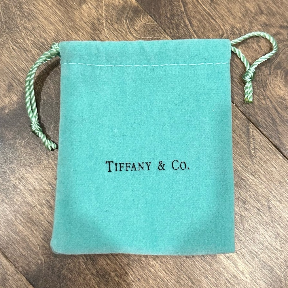 Jewelry boxes and draw string bags.